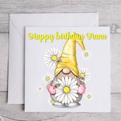 a birthday card with an image of a gnome and daisies