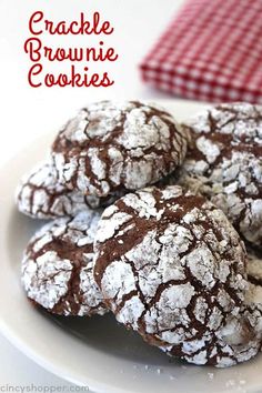 chocolate crinkle brownie cookies on a white plate