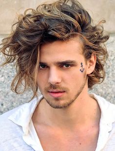 Perhaps a little less blonde than the others on this list, this messy surfer look will actually take a bit of perfecting to get right! Boys Surfer Haircut, Surfer Haircut, Man With Long Hair, Young Men Haircuts, Male Faceclaims, Surfer Hair, Face Shape Hairstyles