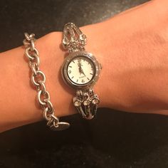 Never Been Worn, New Condition. The Perfect Piece To Pair Up . Needs Batteries. Three Stones On Each Side . Nwot Timeless Adjustable Metal Watch, Adjustable Silver Analog Jewelry And Watches, Adjustable Metal Bracelet Watch, Adjustable Silver Jewelry And Watches With Round Dial, Elegant Nickel-free Metal Watches, Adjustable Metal Bracelet Strap Jewelry And Watches, Coach Watch, Diamond Face, Gucci Watch