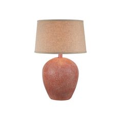 a red vase lamp with a beige shade on it's base and a light brown linen shade on the bottom