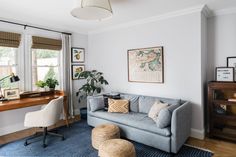 a living room filled with furniture and decor