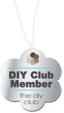 a sign that says diy club member the diy club hanging from a chain