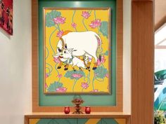 a cow and calf are depicted in this colorful painting