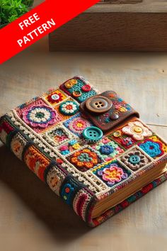 a crocheted book is sitting on a table