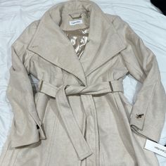 Calvin Klein Coat Bought At Macy’s. Size Xl. Cream Color. Never Worn. New With Tags. Calvin Klein Coat, Calvin Klein Vest, Calvin Klein Sport, Cream Coat, Embroidered Jean Jacket, Buy Coats, Travel Jacket, Black Puffer Vest, Black Wool Coat