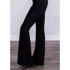 Fitted black high-rise corduroy pant with a bell bottom silhouette. Fits true to size. Trendy High Rise Black Flares, High Rise Black Flares For Fall, Black Cotton Wide Leg Flares, Chic High Rise Black Flares, Casual Black Flares For Night Out, Black Velvet Bottoms For Night Out, Chic Black Flares For Fall, Black Corduroy Bottoms For Fall, Black High Waist Stretch Flares