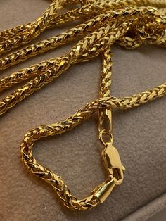 "18k 18k Gold Foxtail Round Necklace ,22\",3mm,8.15 gr 18k Gold Foxtail Round Necklace ,20\",3mm,7.41gr 18k Gold Foxtail Round Necklace ,18\",3mm,6.51gr 14k  14k Gold Foxtail Round Necklace ,22\",4mm, 9.47 gr  14k Gold Foxtail Round Necklace ,20\",4mm,8.50 gr 14k Gold Foxtail Round Necklace ,18\",4mm,7.50 gr This is a Trending Etsy Bestselling Franco Necklace. It is made with Authentic Genuine Real 18K Gold. Easy to layer! Looks beautiful with your favorite charms or even if you wear it alone. BEST PRICE ON ETSY FOR SOLID 18kGOLD FRANCO NECKLACES! Premium spring ring Hook for added safety! Priced to sell! Compare our prices to other similar sellers! Arrives in a GIFT BOX and includes FREE SHIPPING within the USA and Canada. International shipping is available at the most economical rates o Luxury Wheat Chain Necklace As Gift, Luxury Wheat Chain Necklace For Gift, Luxury Necklace With Wheat Chain As Gift, Luxury Necklace With Wheat Chain For Gift, Gold Plated Wheat Chain Necklace, Gold Plated Wheat Chain Necklace As Gift, Luxury Gold Chain Herringbone Necklace As Gift, Yellow Gold Herringbone Necklace With Box Chain For Gift, Gift Gold Plated Wheat Chain Necklace