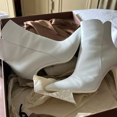 Crafted From Leather, This Bootie Is In Vitello White. Sharpens A Pointed-Toe Fitted Style With A 105mm Stiletto Heel. The Inside Zipper Ensures The Impeccable Fit. Handmade In Italy. Composition: 100% Leather Heel Height: 4.1 Inches / 105 Mm Model Code: G73587.85gom.Vitbian Worn Once, Still Excellent Condition. Callouts In Photos Above ^ Ships With Dust Bag And Extra Heels Purchased From Neiman Marcus Hudson Yards In New York City #Sds Same Or Next Day Shipping Chic Off-white Pointed Toe Boots, White Mid-calf Boots With Pointed Toe, White Faux Leather Ankle-high Booties, White Ankle-high Faux Leather Booties, White Pointed Toe Mid-calf Boots Medium Width, Rossi Shoes, Hudson Yards, Leather Heels, Bootie Boots