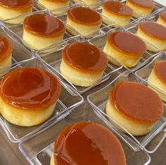 several trays filled with jelly covered donuts