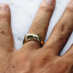 Brass hammered and oxidized rugged band ring for men or women. One of a kind bold hammered statement ring that looks great on any finger or as a pinky ring. Available in Sterling Silver https://etsy.me/2YXAMby Ring Size Available in all sizes. Please be sure to find your exact ring size for the finger you want before ordering. See image chart above or you can use the chart on my website as a guide - https://jewelrylab.co/pages/ring-sizing-tips A note about brass jewelry and oxidization: Verdigri Abstract Ring, Mens Pinky Ring, Mens Band Rings, Gold Color Ring, Hammered Ring, Hammered Rings, Silver Flats, Gold Band Ring, Mens Band