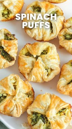 spinach puffs on a white platter with the words spinach puffs above them