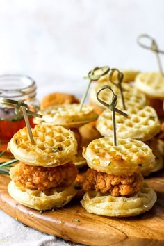 fried chicken and waffles are served on mini waffles with pickles