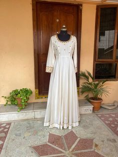 Hand embroidered Anarkali  / cream anarkali suit set / white anarkali dupatta USA / Indian anarkali/ Indian dresses/ voggish / cream anarkali dress          Looking for a perfect indian dress/anarkali/suit sets that are trendy, unique and easy to carry !! yess, You are at the right place. we carry such versatile pieces of anarkalis and suit sets that really let you stand out in any occassion !!      featuring this beautiful pure chanderi dress in cream color with hand embroidered on body  and sl Off White Floor-length Designer Anarkali Set, Designer Off White Dress With Zari Work, Off White Designer Dress With Zari Work, Off White Anarkali Floor-length Gown, Traditional Off White Gown For Designer Wear, Traditional Off White Designer Gown, Traditional Off-white Gown For Designer Wear, Festive Anarkali Gown In Off White, Traditional Off-white Designer Gown