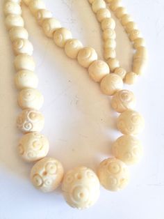 1930's Chinese export carved bone chocker necklace, Art Deco graduated carved bone beads with barrel clasp measures 16 inches. Excellent preowned condition  Free shipping Traditional Carved Round Beads Necklace, Carved Bone Jewelry, Vintage Carved Round Beads Necklace, Luxury Traditional Carved Beads, Vintage Carved Jade Pendant And Beaded Necklace, Beaded Chocker, Chocker Necklace, Bone Necklace, Necklace Art