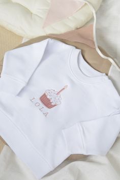 A beautiful Sweatshirt. Each item is hand pressed and embroidered  individually, giving your order that special finishing touch. You can also send direct to a friend and we are able to add on a gift message.  Colour shown in images -  Pink Cake with Pink Text.  Please just message you if require different colours of text.  Made from:100% Cotton , Wash at 40 degrees, iron on reverse and do not tumble dry. Embroidered Cotton Top For Birthday, White Embroidered T-shirt For Birthday, Embroidered Crew Neck Birthday T-shirt, Birthday Crew Neck T-shirt With Embroidered Text, Embroidered Crew Neck T-shirt For Birthday, Embroidered Crew Neck Top For Birthday, Birthday Embroidered Text T-shirt With Crew Neck, White Custom Embroidered Tops For Birthday, White Embroidered Sweatshirt For Gift