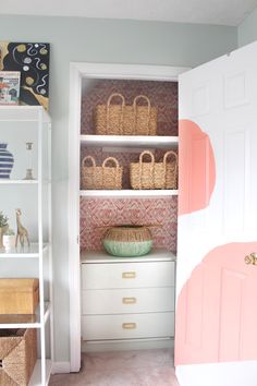 a closet with baskets and other items in it