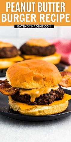 a cheeseburger on a black plate with the words, how to make a peanut butter burger recipe