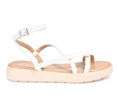 Make your summer a little more stylish with the Jeselia by Journee Collection. Vegan leather straps shape this adorable sandal. With an adjustable buckle strap and 4 mm Tru Comfort Foam™ footbed, you'll be walking on sunshine every time you wear them. Luxe Vegan Leather upper, Adjustable buckle closure, Approx. 1 1/4\ sole, Open toe, Tru Comfort Foam™ footbed for added comfort, Man-made outsole, Crisscross strap detail | Women's Journee Collection Jeselia Sandals in White Size 11 Medium Summer T-strap Sandals With Adjustable Ankle Strap, Trendy Adjustable Strap Sandals, White Wedge Sandals With Adjustable Strap For Summer, Adjustable Single Toe Strap Footbed Sandals For Summer, Summer Adjustable Footbed Sandals With Single Toe Strap, White Adjustable Slingback Sandals With Buckle Closure, Summer Sandals With Adjustable Ankle Strap, Adjustable White Slingback Sandals With Buckle Closure, Spring Double Strap Wedge Sandals With Cushioned Footbed