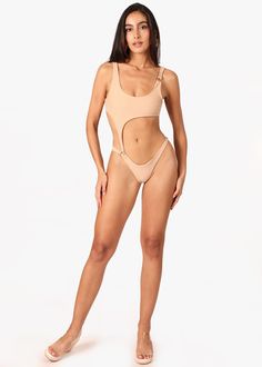 'Indie' Monokini 82% Polyamide | 18% ElastanDesigned in MiamiMachine Wash ColdModeled in size SMModel Measurements: Height 5’7”, Waist 24, Bust 31, Hips 32 Fitted Cutout Swimwear For Sunbathing, Beachwear Cutout Tankini, Cutout Tankini For Poolside, Fitted Cutout Tankini For Sunbathing, Fitted Cutout Swimwear For Beach Season, White Monokini, Dress Cover, Monokini, White Beige