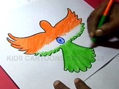 a child's drawing of a bird with orange and green feathers