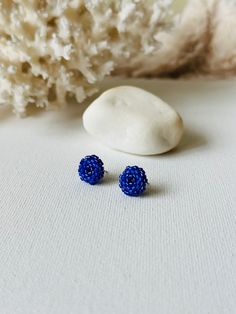 Make your everyday outfit more shiny wearing these blue beaded post earrings. These statement stud earrings are made from Miyuki Delica seed beads and supplied with stainless steel accessories. So lightweight and comfortable to wear, these dainty beaded studs would be the perfect addition to your holiday look. If you're looking for delicate seed bead earrings for winter, this pair is a great finding for you. Also, these minimalist earrings are making a great Christmas gift for bohemian jewelry l Blue Earrings With Spacer Beads For Gift, Handmade Blue Cluster Earrings For Gift, Blue Earrings With Tiny Beads As A Gift, Beaded Studs, Steel Accessories, Stainless Steel Accessories, Christmas Bead, Dainty Studs, Earrings Christmas