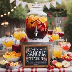 an outdoor sangria station with fruit and drinks