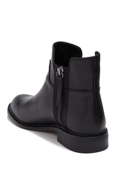 The Halford is a classic leather boot with moto-inspired exposed zippers for that on-trend look that lasts. Sizing: True to size. M=standard width. Round toe. Topstitched welt. Dual shaft zip closures. Lightly cushioned footbed. Low block heel. Approx. 5.25" shaft height, 9" opening circumference. Approx. 1" heel. Imported Black Flat Ankle Boots, Ankle Boots Flat, Franco Sarto Shoes, Leather Boot, Franco Sarto, Womens Boots Ankle, Classic Leather, Black Ankle Boots, Dress With Boots