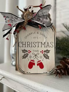 a christmas decoration on top of a mantle