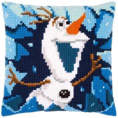 a cross stitched pillow with an image of a snowman on it