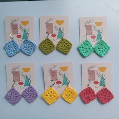 six crocheted earrings are displayed on a white card with a pink, blue, yellow and green earring