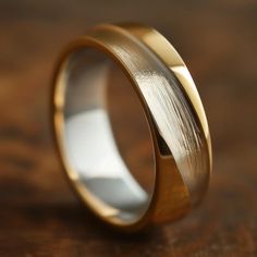 Men's wedding band with a brushed finish and asymmetric design, available in different shades of gold or platinum. Unusual Wedding Rings Men, Men's Engagement Bands, Mens Wedding Rings Gold Unique, Gold Wedding Rings Men, Wedding Ring Men Gold, Mens Wedding Bands Gold, Men’s Wedding Rings, Men’s Wedding Band, Mens Gold Engagement Rings