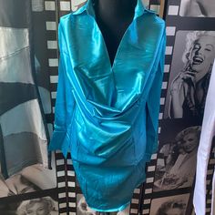 Ladies Sassy Satinny Shirt Dress Size Large Blue Satin Long Sleeve Mini Dress, Elegant Light Blue Blouse For Party, Elegant Light Blue Party Blouse, Chic Blue Shirt Dress For Party, Blue Long Sleeve Satin Midi Dress, Long Sleeve Blue Shirt Dress, Blue Long Sleeve Shirt Dress, Light Blue Long Sleeve Dress For Night Out, Fitted Light Blue Long Sleeve Shirt Dress