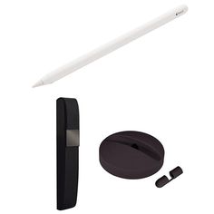 a white pen and some black items on a white background