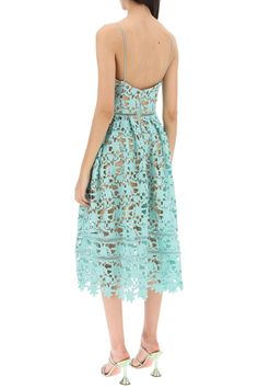 Sacai dress crafted in embroidered floral lace. Characterized by a waisted bodice with scoop V-neck and spaghetti straps, this model boasts a pleated circular skirt, back zipper closure and lined interior. Regular fit with midi length. The model is 177 cm tall and wears size UK 8. Size Info UK Color Detail Light blue Made In China Material 100%PL Season One spring Season Two summer Product clothing Brand Self Portrait Size And Fit Lace Patchwork Midi Lace Dress, Lace Patchwork Midi Length Dress, Summer Midi Dress With Lace Trim For Wedding Guest, Midi Length Lace Dress With Lace Patchwork, Summer Wedding Guest Midi Dress With Lace Trim, Lace Patchwork Midi Dress, Spring Lace Midi Dress, Spring Midi Lace Dress, Lace Dress With Lace Patchwork And Spaghetti Straps