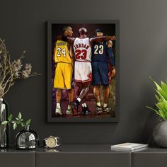 three basketball players standing together in front of a wall