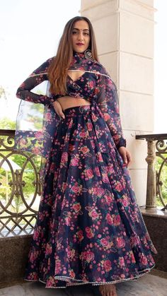 PRODUCT DESCRIPTION: LEHENGA: ORGANZA BLOUSE:  ORGANZA DUPATTA: ORGANZA COLOR: BLUE PRINTED LINING: cotton silk lining No. Of Components : Set of 3 Wash Care : Dry Clean  MADE TO ORDER US Size Conversion: XS = 0, S = 2-4, M = 6-8, L = 10-12, XL = 14, 2XL = 16, 3XL = 18, 4XL = 20, 5XL = 22, XSP = 0P, SP = 2P-4P, MP = 6P-8P, LP = 10P-12P, XLP = 14P, 2XLP = 16P, 3XLP = 18P, 4XLP = 20P, 5XLP = 22P Size Guide in inches (garment measurements): Regular - 5' 4'' to 5' 8'' height Size, US size, Bust, Wai Unique Blouse Designs For Lehenga Full Sleeves, Full Sleeves Lehenga Blouse, Blue Organza Lehenga, Floral Organza Lehenga, Drape Dupatta, Organza Outfit, Floral Print Lehenga, Blouse Organza, Print Lehenga