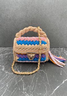 🧶MATERIAL: Bags Planet crochet bag is made of 100% recycled combed cotton yarn material. Due to this recycled combed yarn material, the woven purse does not contain chemicals that may affect human health. ✔️SIZE: This knitted handbag has strap length (100 cm), height (18-20 cm) and length (22-23 cm) dimensions. Since each step of this unique colorful bag is 100% handcrafted, there may be slight variations in size. ✨FUNCTIONAL USE: Bags Planet bohemian purse has two different uses, both as a hand bag and as a crossbody bag. In the summer months, you can use this color bag according to the invitation you will attend by making a handbag. 🧼WASHING: It is not recommended to wash the Bags Planet yarn bag in the washing machine because the accessories are damaged after washing. It is recommende Luxury Multicolor Crochet Bag For Everyday, Planet Crochet, Artisan Multicolor Crochet Bag With Adjustable Strap, Luxury Multicolor Crochet Woven Bag, Bohemian Hand-knitted Yarn Shoulder Bag, Crossbody Bag Crochet, Bohemian Purse, Eco-friendly Multicolor Crochet Bag With Handles, Multi Colored Bag