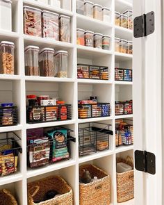 an organized pantry with baskets and food items