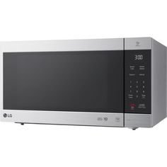 a silver and black microwave oven on a white background with the door ajar open