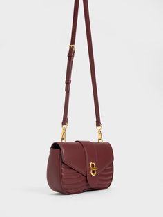 From the smooth curved silhouette, plush padded body and luxurious dark chocolate finish, our Aubrielle crossbody bag will have you channelling elegance and sophistication in an instant. It features a roomy interior that can hold your everyday essentials and more with ease. Plus points for the metallic turn-lock closure that adds a touch of shine that will add a shine to your look. Look Put Together, Charles Keith, Special Promotion, Everyday Essentials, Dark Chocolate, Everyday Essentials Products, Crossbody Bag, Product Launch, Faux Leather