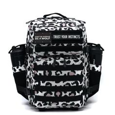 a white and black leopard print backpack with the words trust your insticts on it