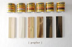 several different types of paint and some wood