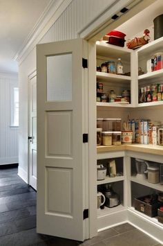 an open pantry with lots of food in it