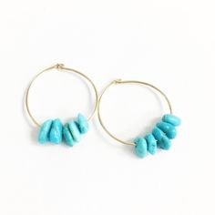 Genuine Turquoise Earrings Our turquoise cluster hoop earrings are perfect for your everyday boho style!! D E T A I L S - 5 Kingsman Arizona genuine turquoise nuggets . - Graces 14kt gold filled hoop earrings. 20mm ∙ EXTRA LOVE ∙ Crafted and curated just for you in the desert of our Arizona studio. All of our jewelry comes gift packaged! We are happy to leave a note if this is a special gift, just let us know in the message box at checkout. PRODUCTION ∙ TIMES All items are made to order. Please Turquoise Jewelry Boho, Gold Filled Hoops, Earrings Turquoise, Message Box, Love Craft, Jewelry Boho, Scottsdale Az, Genuine Turquoise, In The Desert