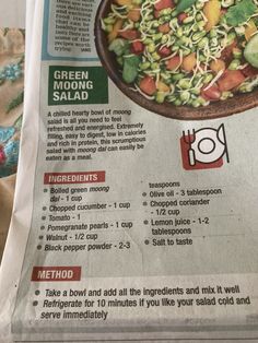 a close up of a menu with food in it on a table next to utensils