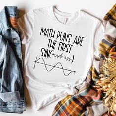 a t - shirt that says math puns are the first snowfloss on it