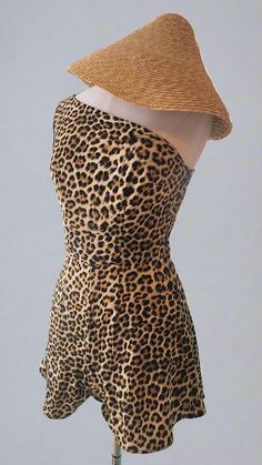 This A-Symmetrical Leopard Print Romper features stretch material and a side zipper for easy wearing. With its trendy leopard print pattern, this romper is perfect for adding a touch of boldness to your wardrobe. Fits a size Medium/Large approximately 38" Bust x 30" Waist Chic Fitted Leopard Print Jumpsuits And Rompers, Chic Fitted Leopard Print Jumpsuit, Pride Shoes, Leopard Print Pattern, Men Plus Size, Vintage Inspired Outfits, Printed Rompers, Halloween Dress, Plus Size Swimwear