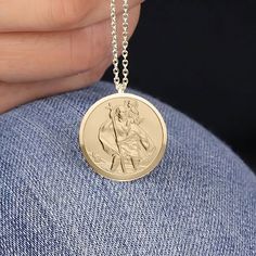 A stunning St Christopher necklace in 18ct gold plated sterling silver that you can personalise with engraving on the back This beautiful charm features the iconic image of St Christopher carrying the Christ child across the river. St Christopher is widely regarded as the patron saint of travellers, offering protection and blessings on journeys. Personalise the back of this St Christopher pendant by choosing to engrave a name, date, initials or short message in your choice of font to create a ve Gold Coin Necklace Gift, Gold Coin Necklace With Polished Finish As Gift, Polished Coin Necklace With Round Pendant For Gift, Polished Finish Coin Necklace With Round Pendant For Gift, Polished Finish Round Pendant Coin Necklace As Gift, Sterling Silver Hallmarked Coin Necklace Gift, Polished Round Medallion Necklace For Gift, Round Medallion Necklace With Polished Finish For Gift, Personalized Yellow Gold Medallion Necklace Gift