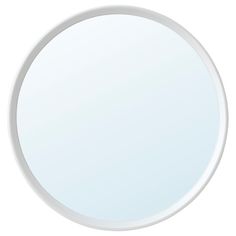 a white round mirror on a white background with no image in the frame to describe what it is